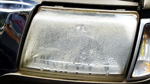 water in car headlight